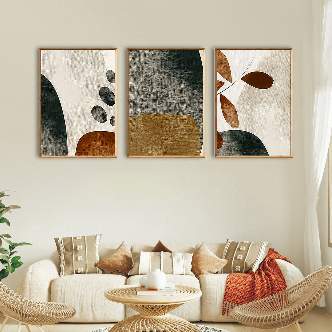 Warm-toned abstract wall art set with minimalist patterns displayed in a cozy living room with neutral furniture and earthy accents.