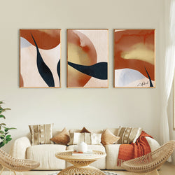 Earth-tone botanical wall art set with abstract leaves

